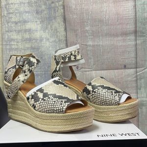 Brand new Woman’s Wedge Sandals. Nine West.